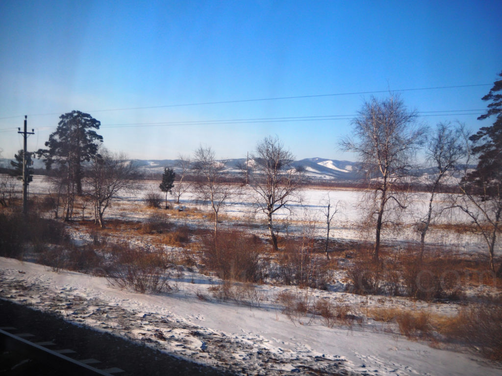 Transsibirische Eisenbahn Winter Schnee Berge Steppe